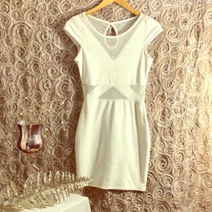 Mini dress with lace mesh cut outs & key hole back